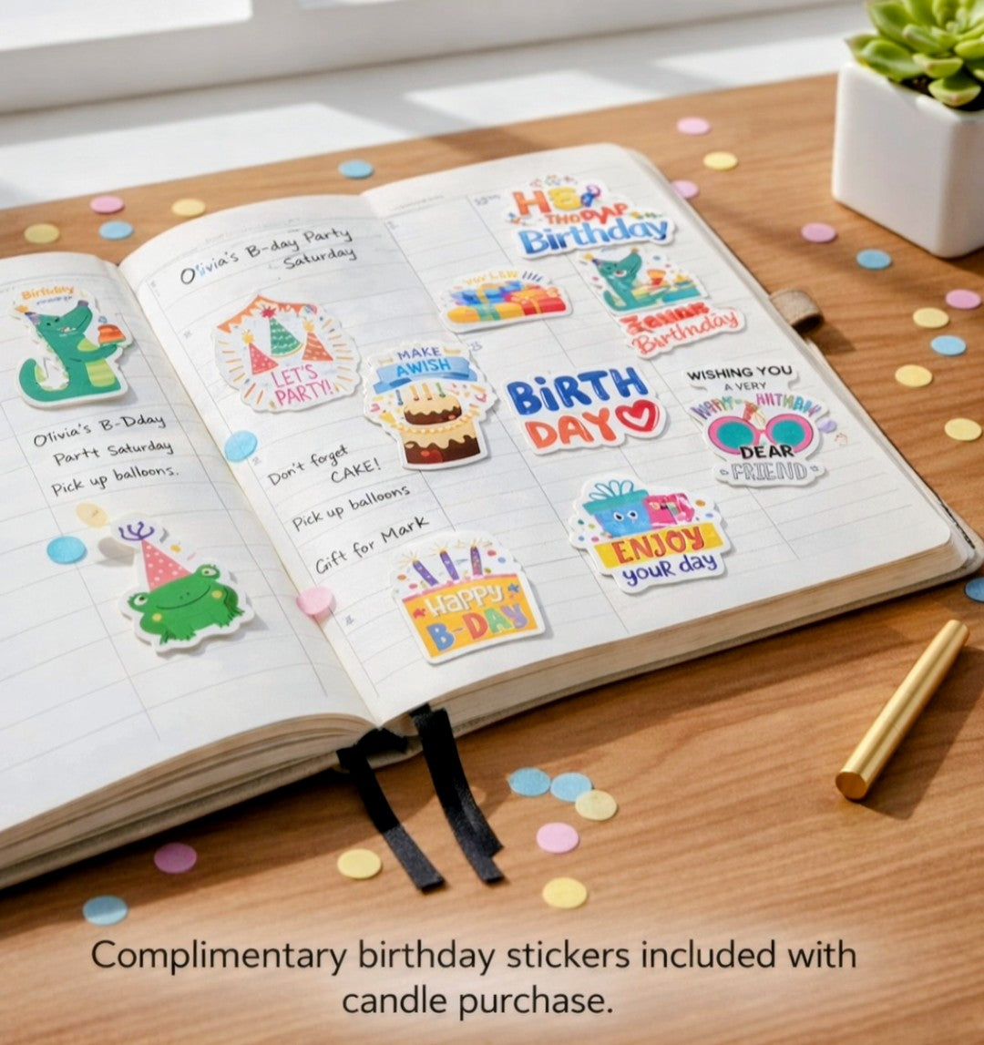 Open notebook with birthday-themed stickers on a wooden surface with confetti. Random birthday stickers with candle purchase.