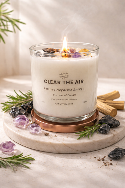 Clear the Air intentional candle in glass jar styled with crystals, herbs, and soft neutral decor